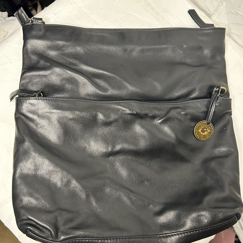 Minooy buttery smooth Black Leather Bag with Gold Accent. Various compartments.